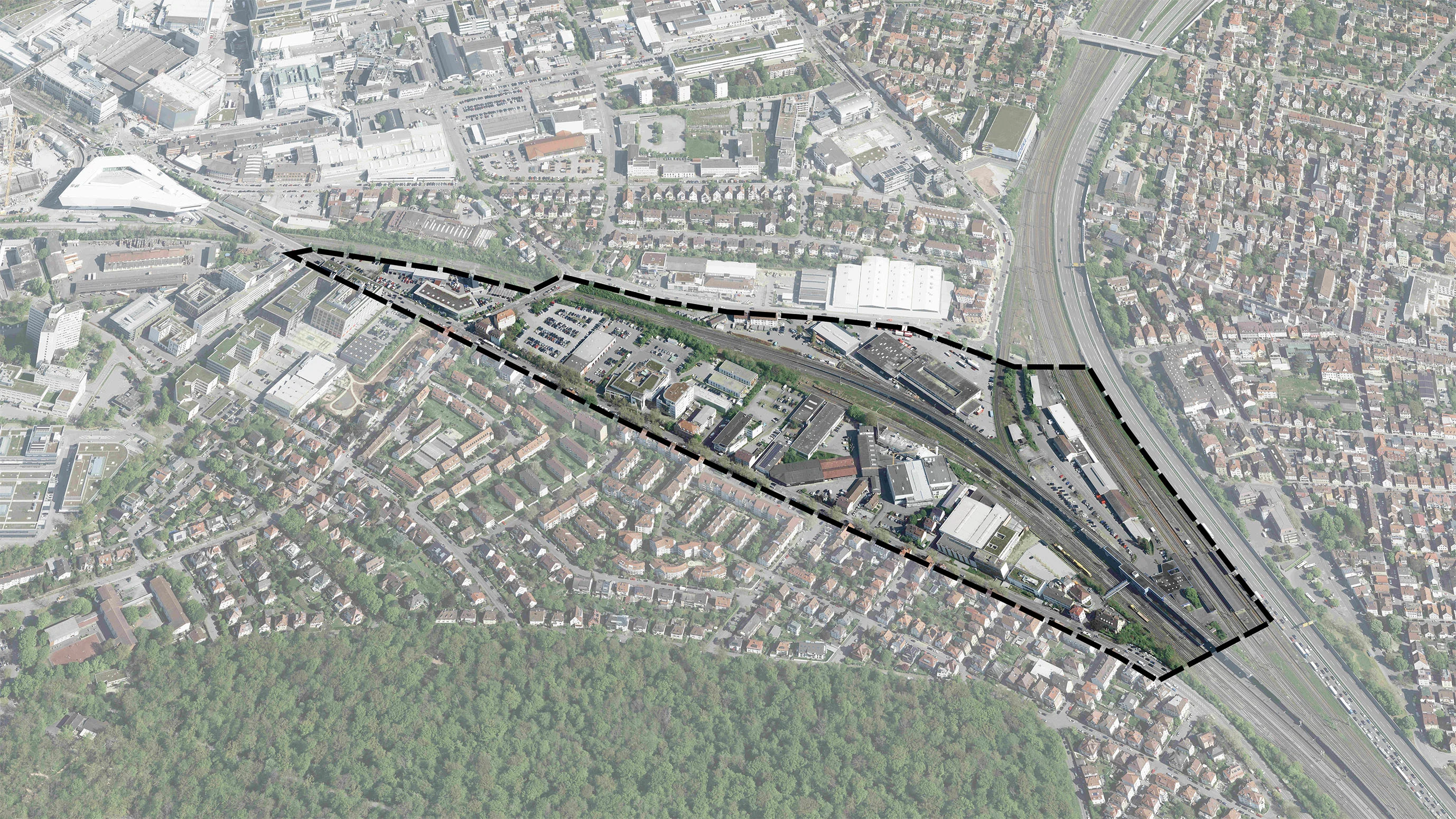 Luftaufnahme eines Stadtgebiets mit markiertem Plangebiet in polygonaler Umrandung